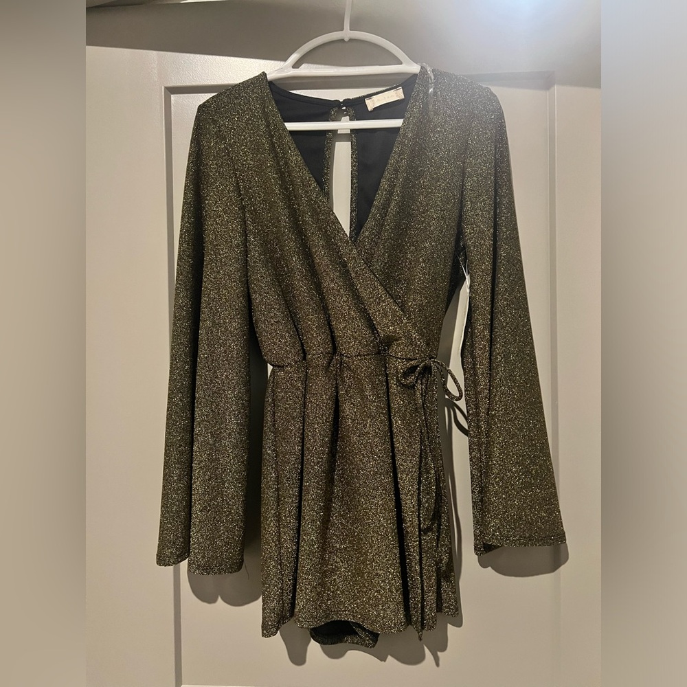Women’s romper with deep V and long sleeves